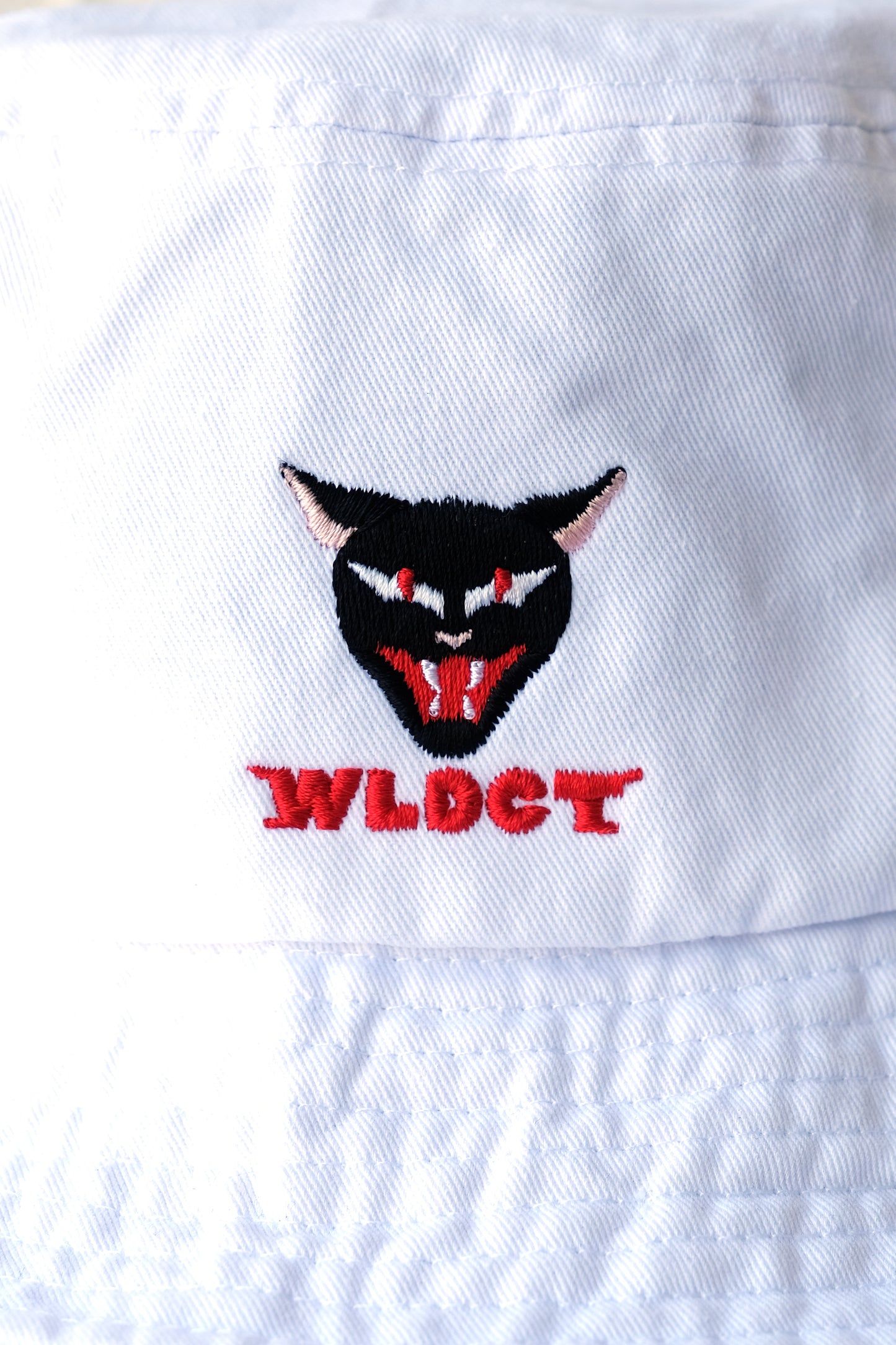 White WLDCT Embroidered Bucket Hat