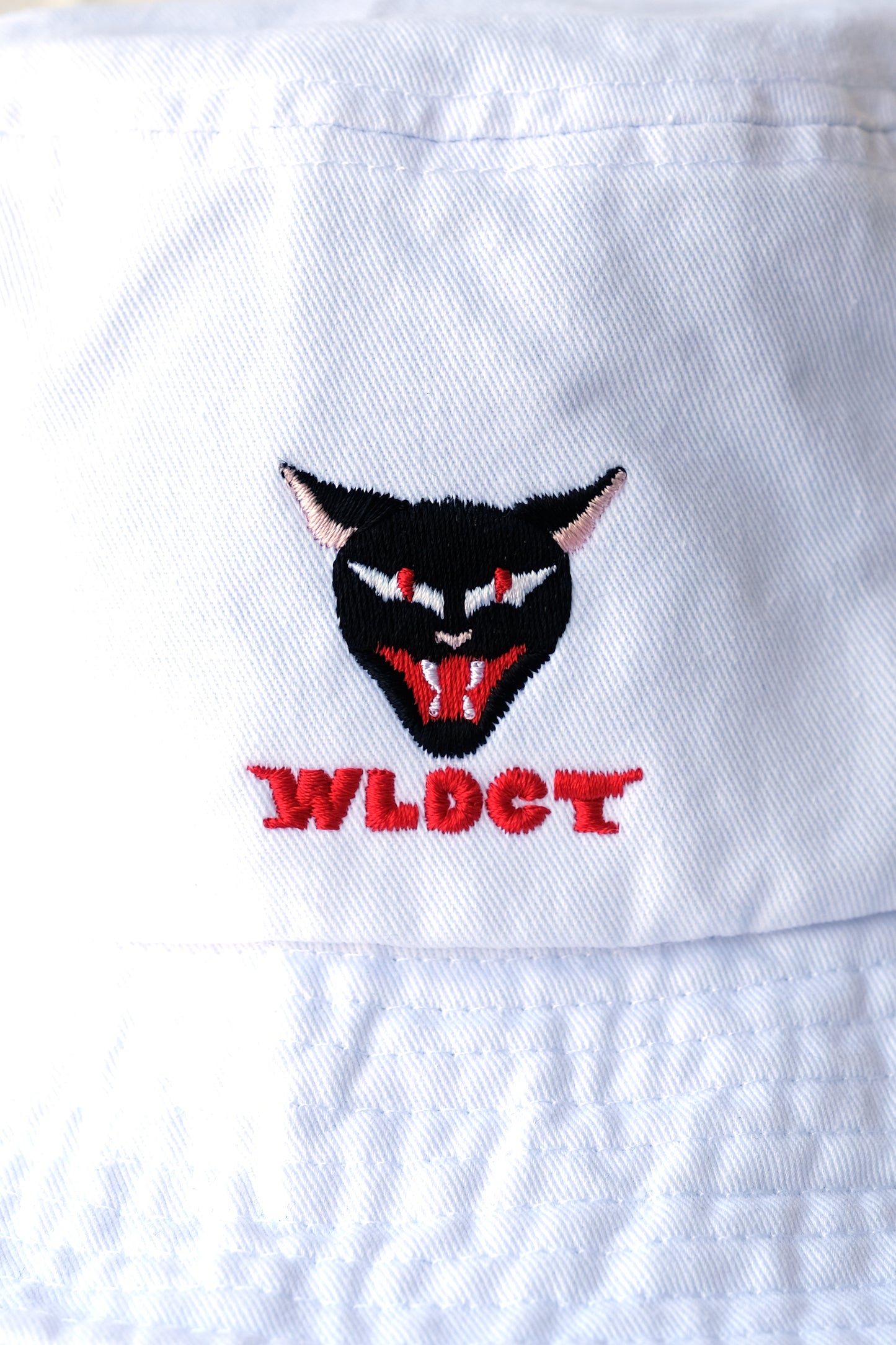 White WLDCT Embroidered Bucket Hat