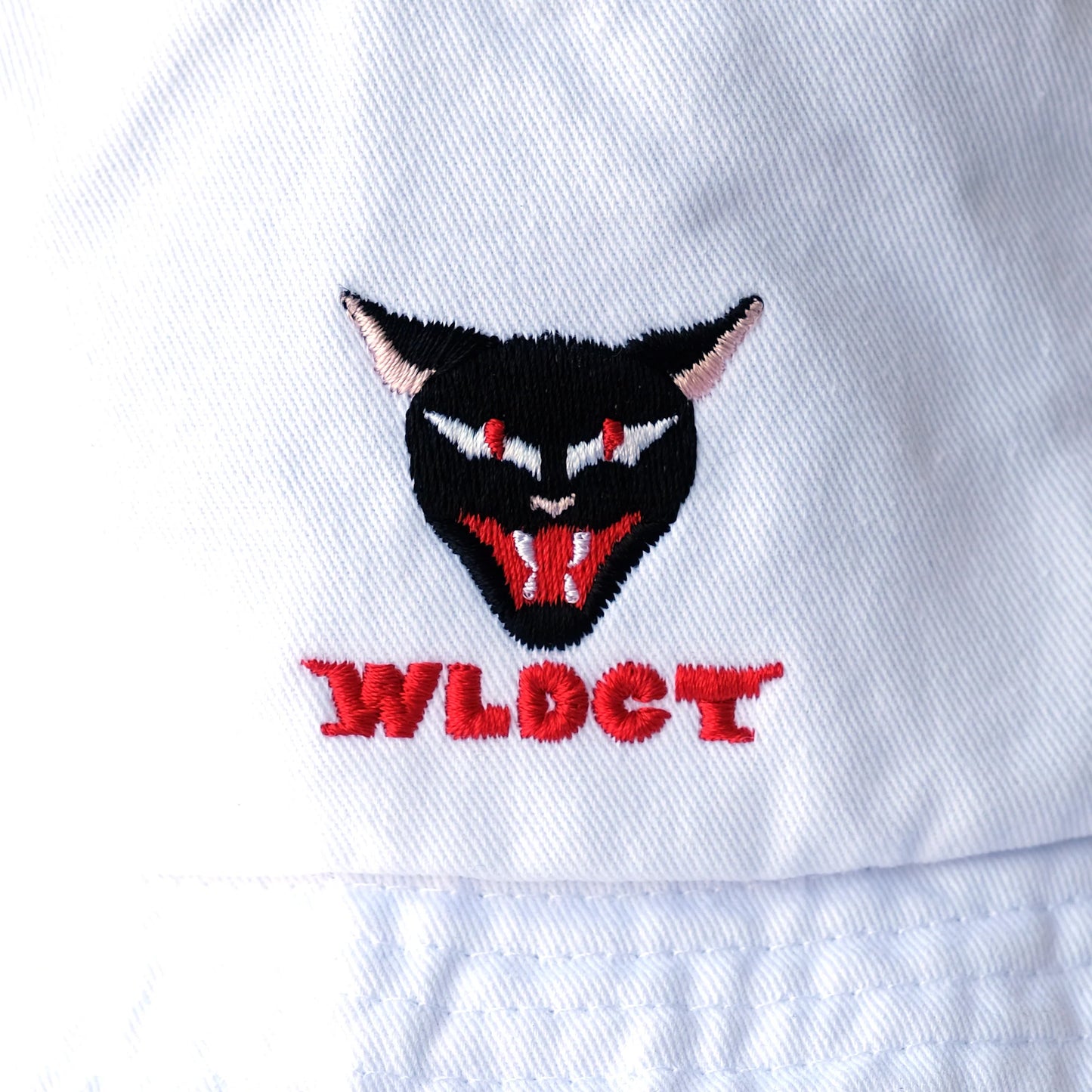 White WLDCT Embroidered Bucket Hat